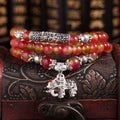 Handmade watermelon crystal bracelet with traditional Chinese knot design in geometric beads
