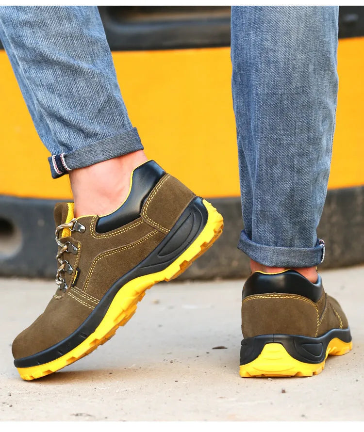 Bronze cow suede leather men's safety boots with a steel toe cap and patterned non-slip sole.