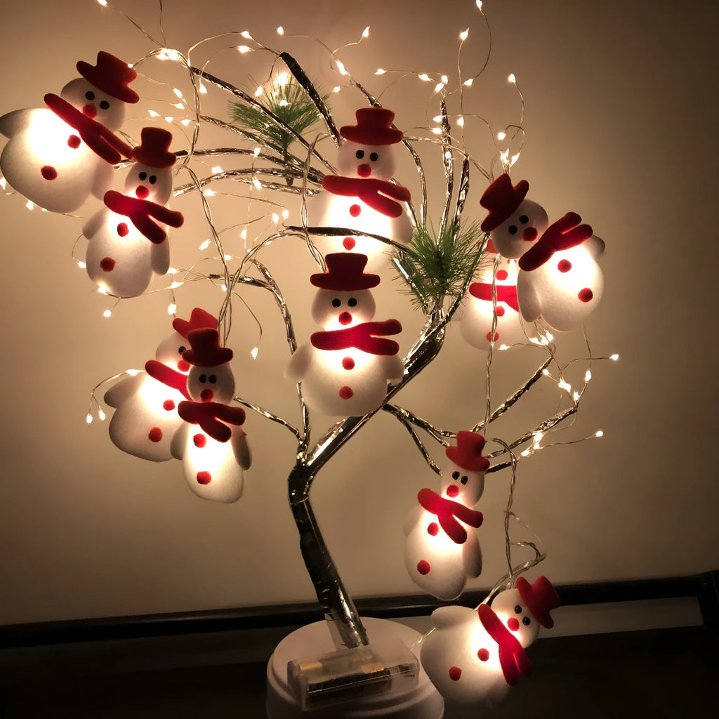 Snowman LED Christmas string lights garland with warm white LEDs on green wire
