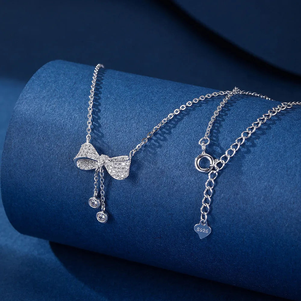 Sterling silver 925 necklace with bow pendant on O-ring chain, 40-45cm length