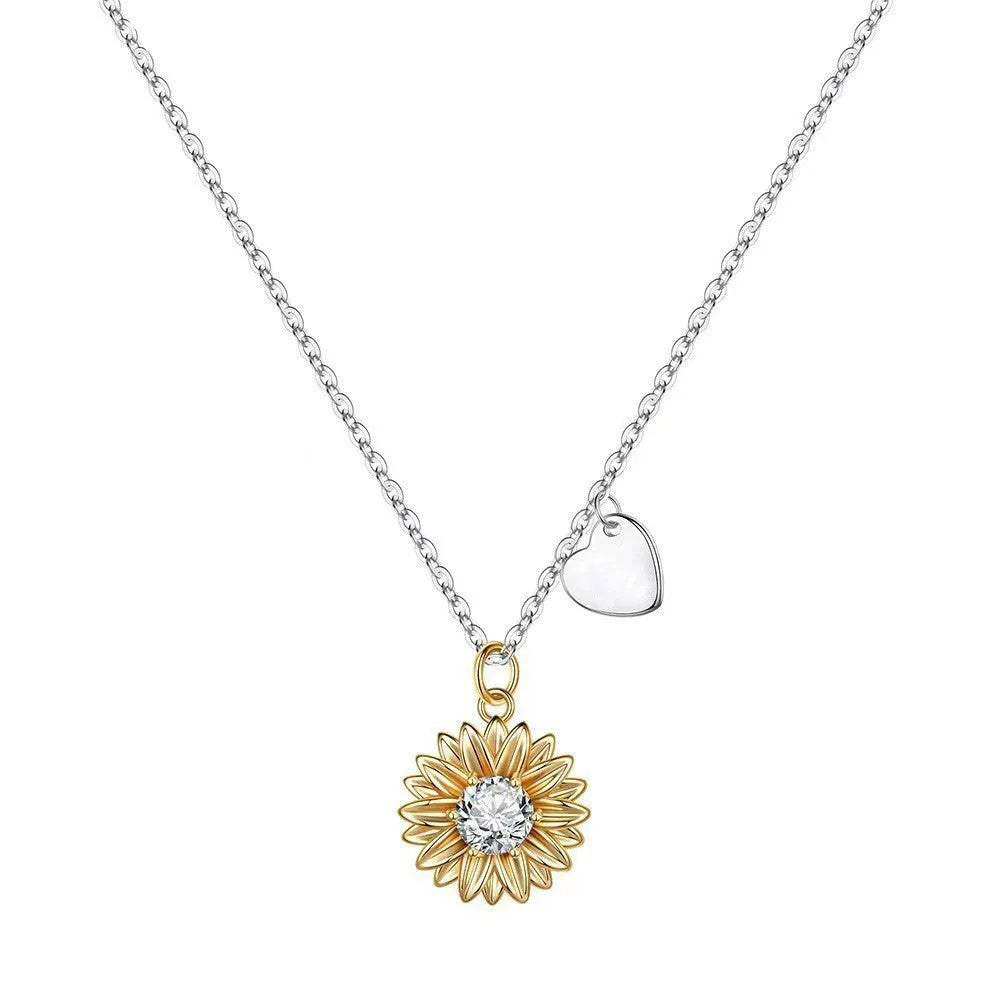 925 sterling silver sunflower daisy pendant on an adjustable cross chain necklace.