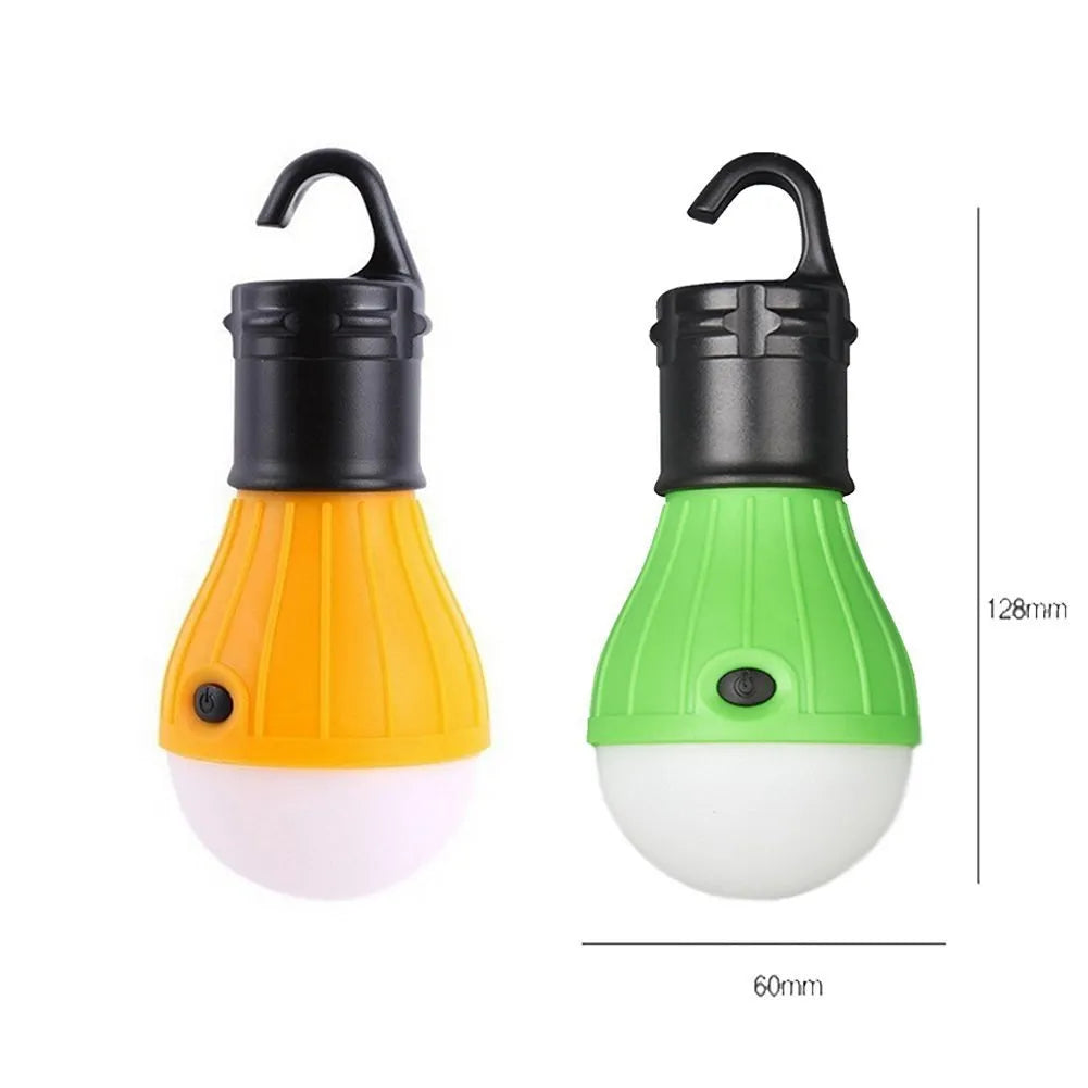 Blue portable LED camping lantern with hanging hook, showing scale against a ruler.