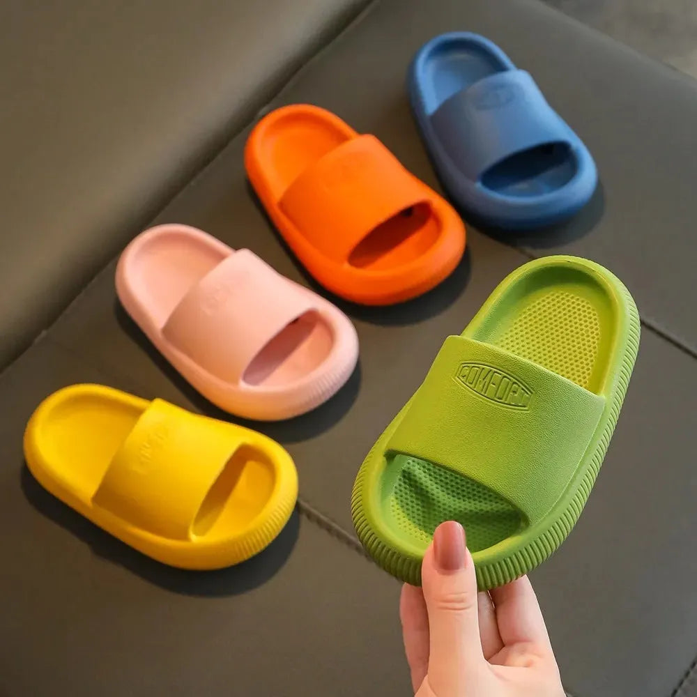 Children's mixed colour EVA slippers with non-slip soles showing 1.5cm thickness