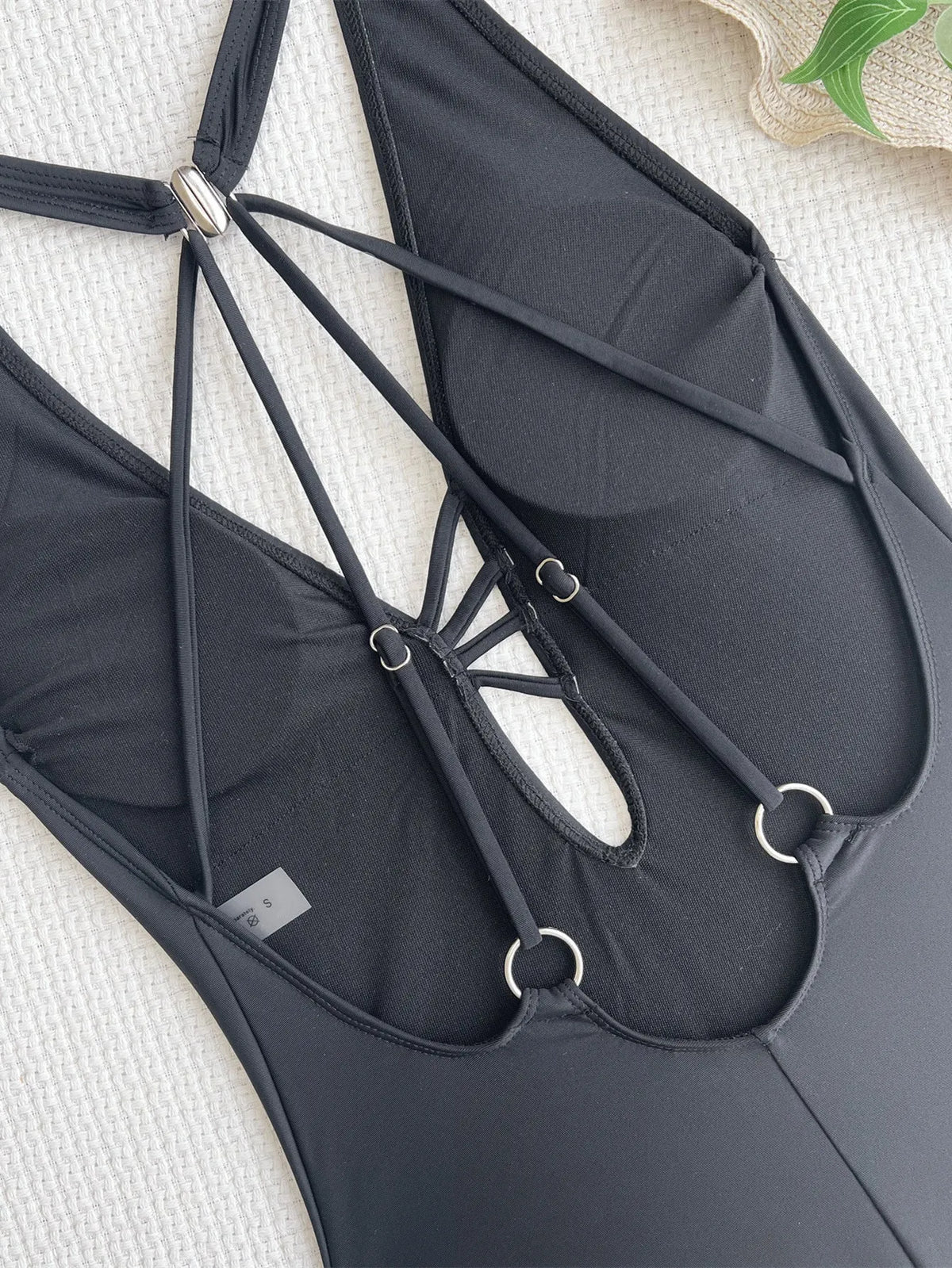 Black solid colour ladies nylon bikini swimsuit showing front and back views