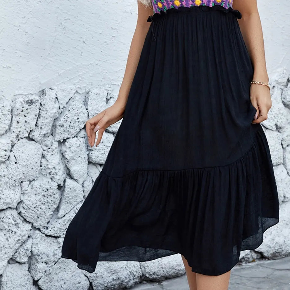 Purple sleeveless dress with hand-hooked white floral stitching and acrylic skirt.