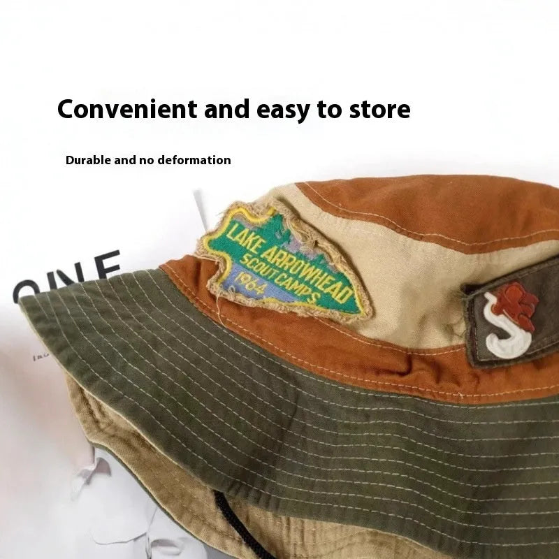 Army green cotton fisherman hat with hand-painted patchwork and flat top crown