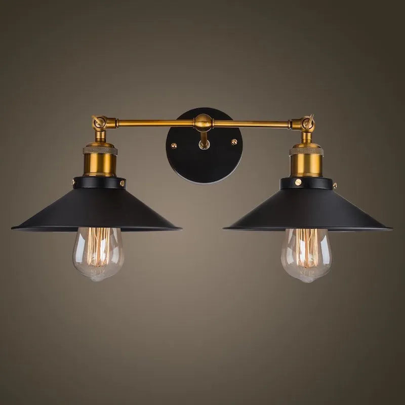 Black iron industrial-style wall lamp with two adjustable heads in a retro design