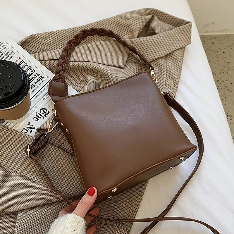 Retro woven PU leather one-shoulder crossbody bucket bag shown in khaki, black, and brown colour options.