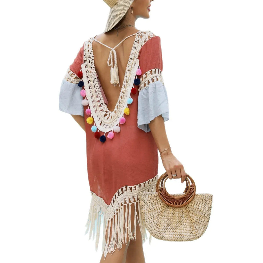 Orange floral pattern beach overskirt with hand crochet stitching and tassel trim details