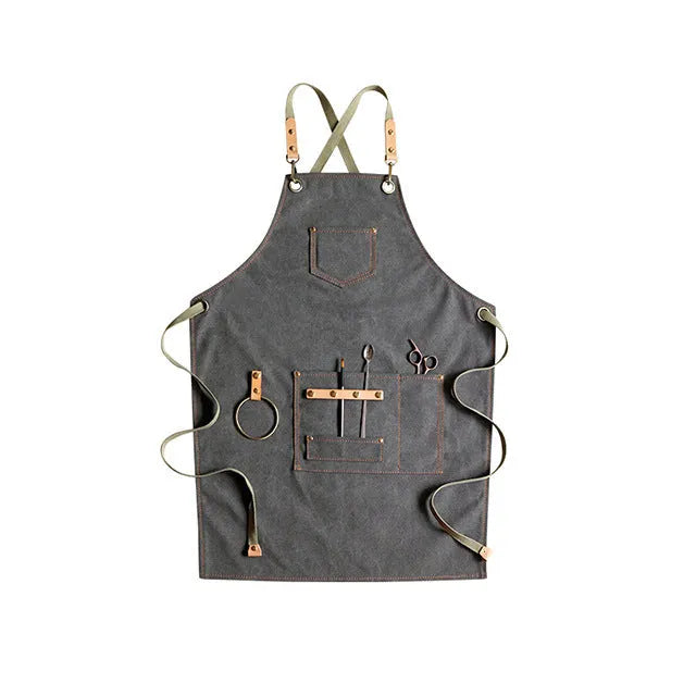Canvas apron with cross strap back design in camel colour for baking and gardening protection