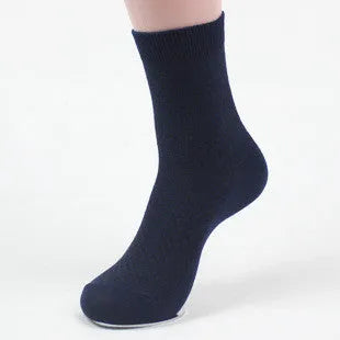 Men's black bamboo fibre socks with small square pattern on ankle