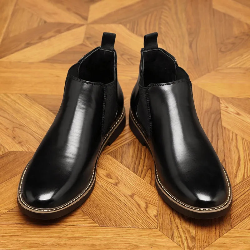 Men's black and brown formal pointed-toe leather boots with a square heel and rubber sole.