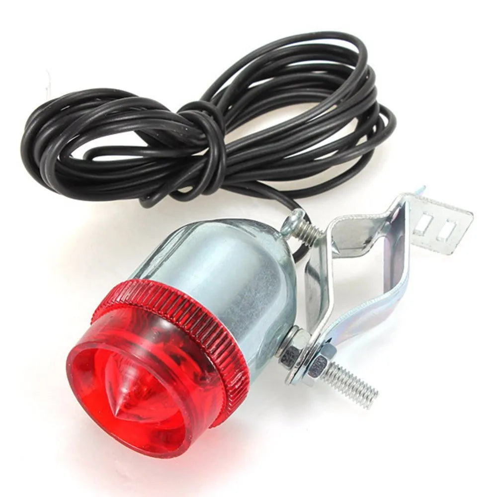 Silver bicycle dynamo-powered light generator kit for front fork or rear frame mounting.