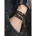Black geometric beaded bracelet with layered design and natural style jewellery