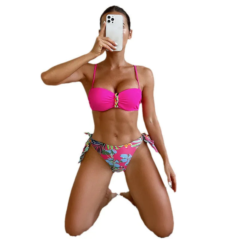 Rose red women's bikini swimsuit with braid rope detailing on display