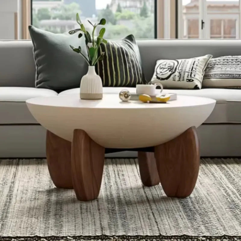 White solid wood coffee table with adjustable height feature and storage compartment