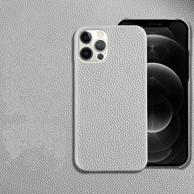 Genuine brown leather shatterproof protective case for iPhone on a table.