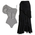 Women's striped one-piece swimsuit with ruffle detail on polyester fabric.