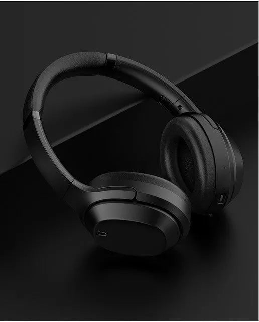 Black Bluetooth wireless headset with over-ear design and memory-protein ear cushions