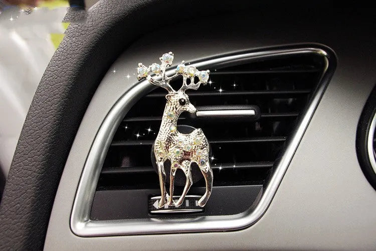 Alloy car air vent fragrance clip in a decorative handbag style.