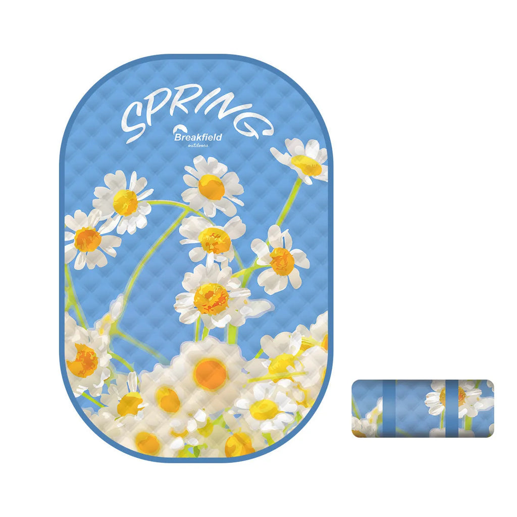 Waterproof picnic mat with brushed fabric texture shown in seasonal colour options