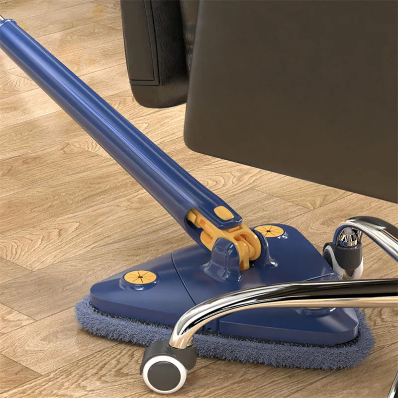 Blue extendable triangle cleaning mop with rotating head and long stainless steel pole on a tiled floor.
