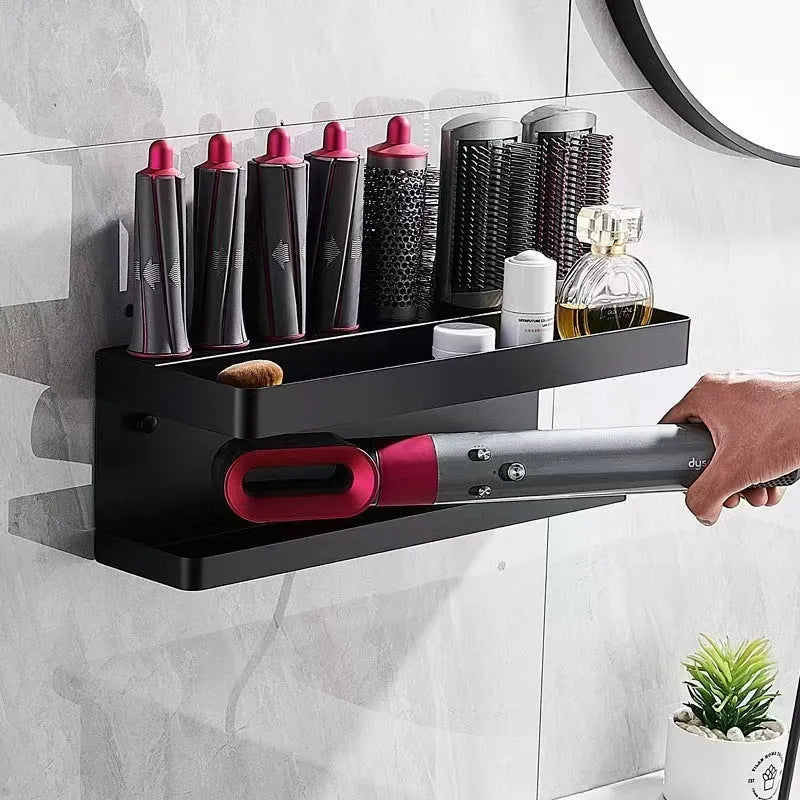 White aluminium double-layer bathroom storage rack mounted on wall holding hair styling tools