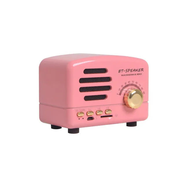 Vintage wood finish Bluetooth speaker in black, pink and wood grain colours showing compact 93x70x59mm dimensions