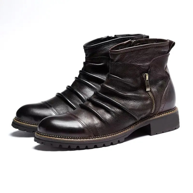 Men's brown side-zip cowboy Martin boots with round toe and horseshoe heel on a wooden background.