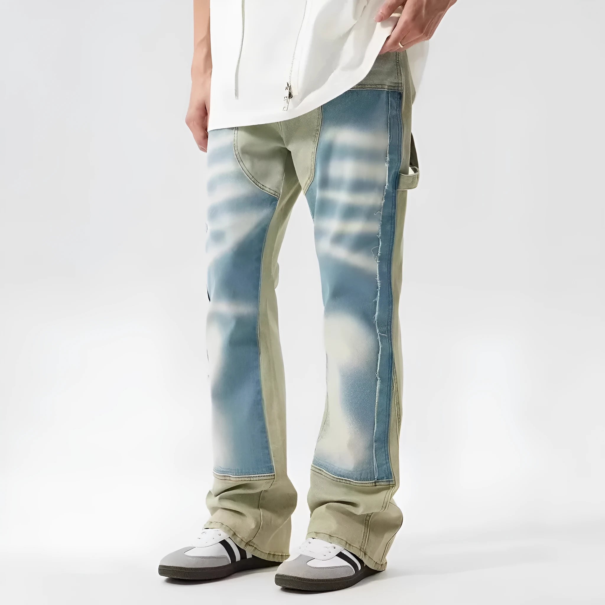 Yellow and blue retro jeans with patchwork and splash-ink damaged design, mid-waist cut.