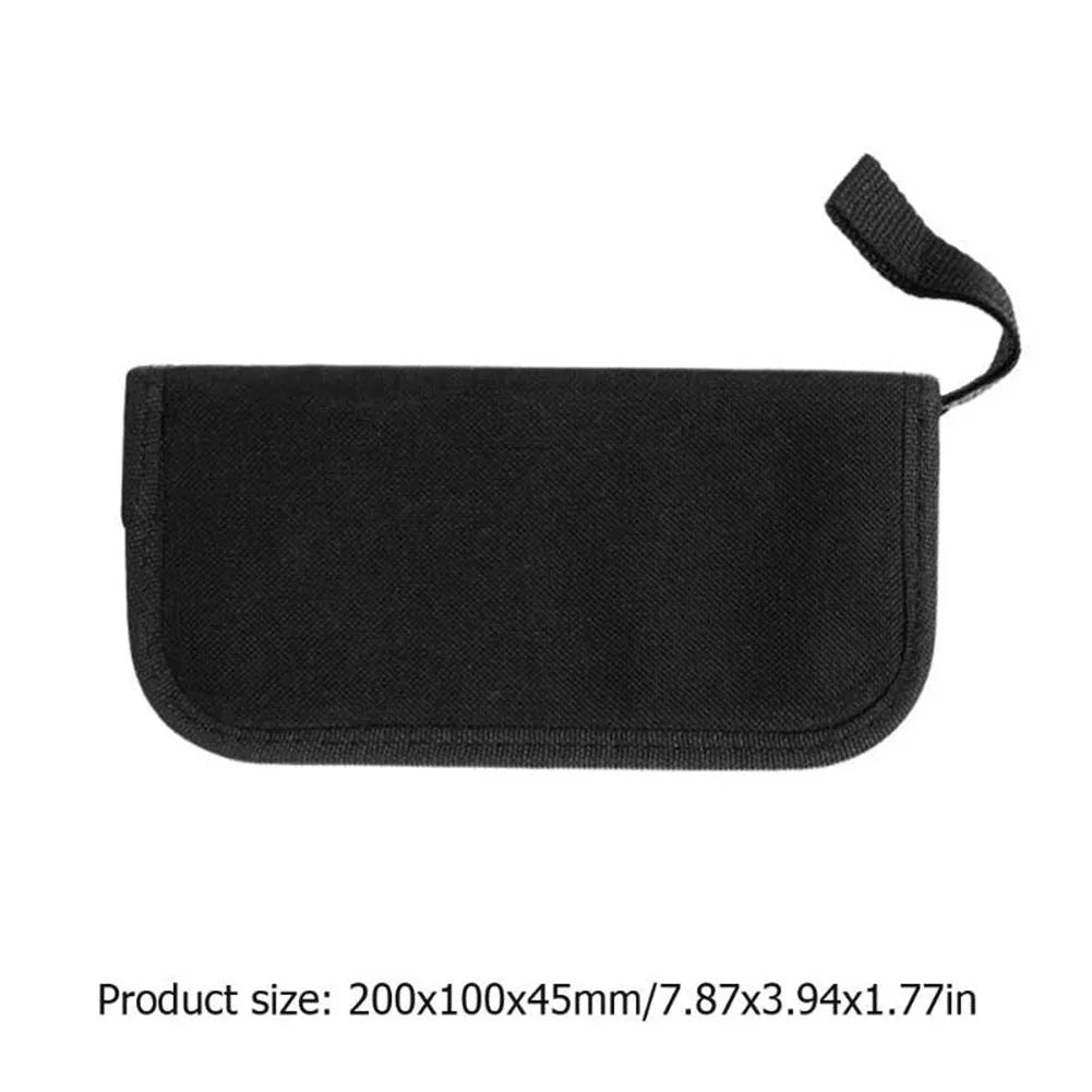 Black guitar repair and care tool kit with plastic and metal tools for instrument maintenance.