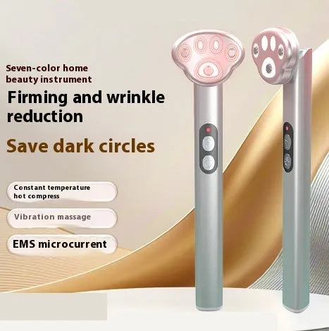 Gradient pink cat's paw shaped eye beautification instrument with micro-current therapy functions