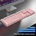 Wireless Bluetooth keyboard with mute button in Cherry Blossom Pink colour on a desk.