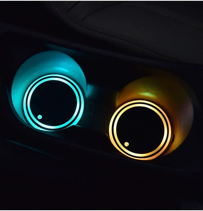 LED light-up cup coaster for cars showing seven colour modes and USB charging cable