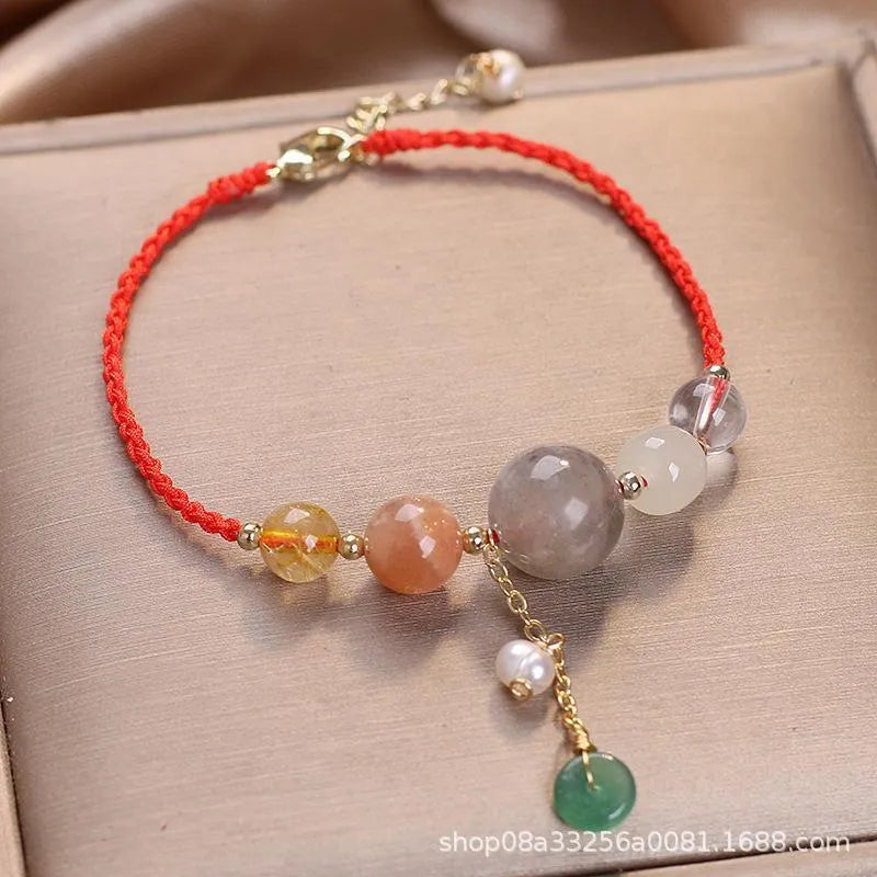 Hand-woven crystal sequin bracelet with peace buckle closure in blue, green and red colour options