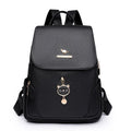 Women's casual soft PU backpack with three-dimensional front pocket in black, blue, or taro purple colours