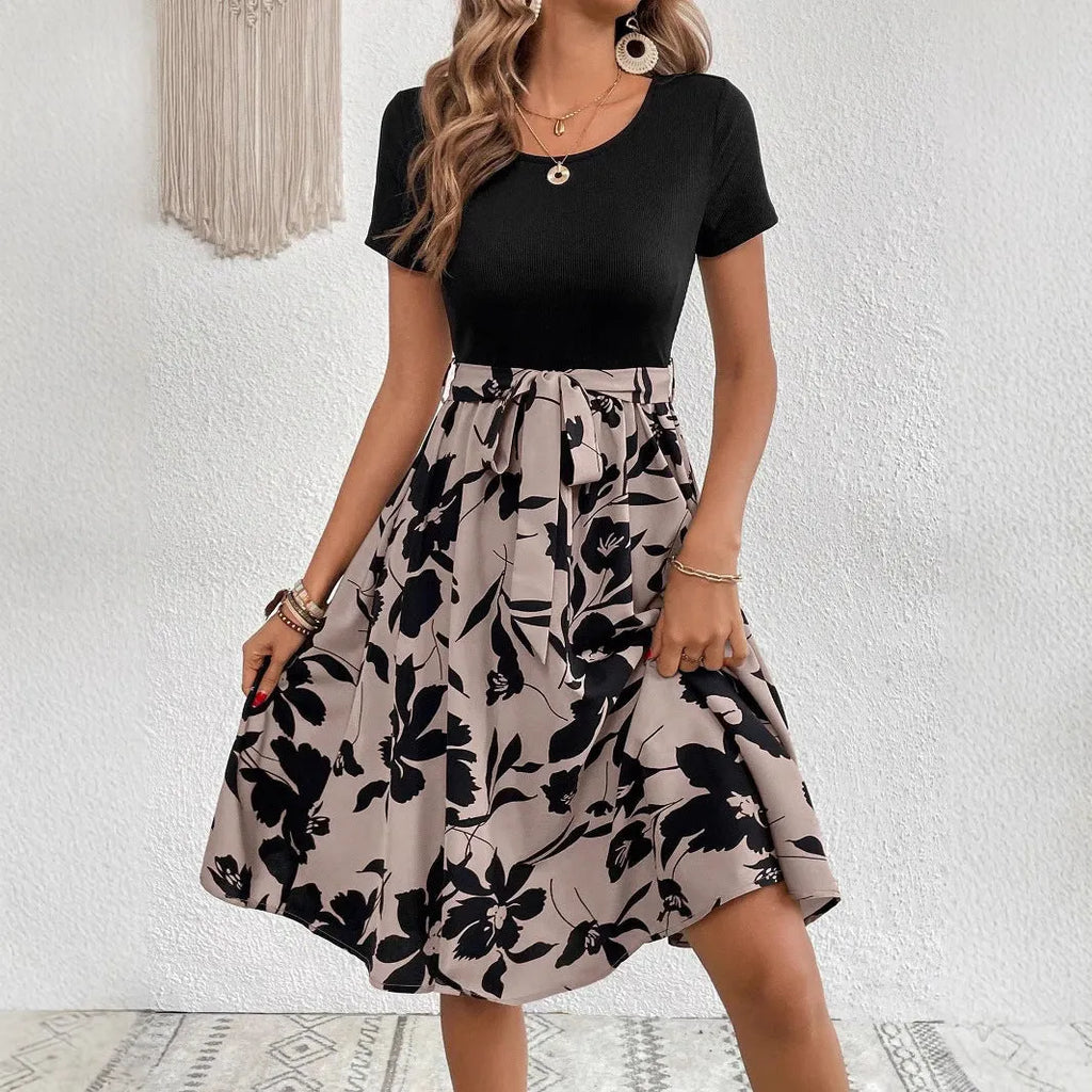 Women's khaki dress with plant pattern, A-line skirt, and shoulder strap detailing