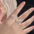 Adjustable open mouth jasmine flower ring in zinc alloy with electroplated finish
