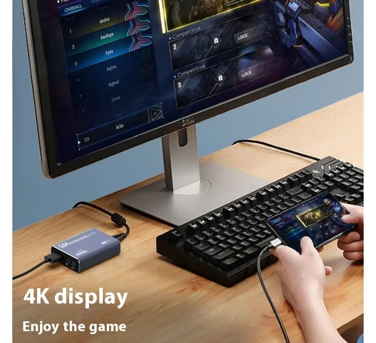 Black 4K gaming set-top box with audio recording functionality and universal system compatibility