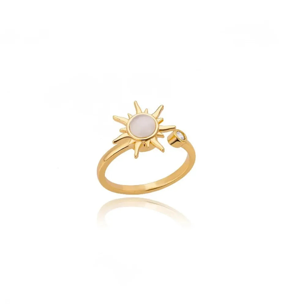 Geometric decompression ring with adjustable opening in gold or platinum colour