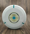 Black and white AC automatic sweeping robot cleaner on a hardwood floor.
