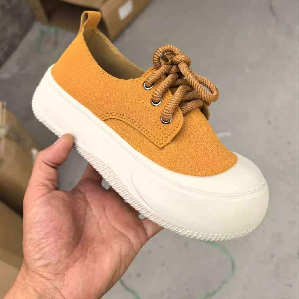 Women's camel suede platform loafers with round toe, flat heel, and front lace-up.