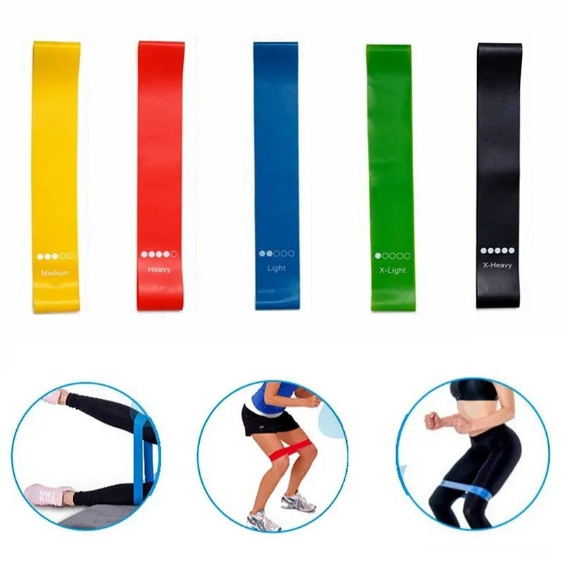 Set of five yoga tension straps in various colours including green, blue, yellow, red, and black options
