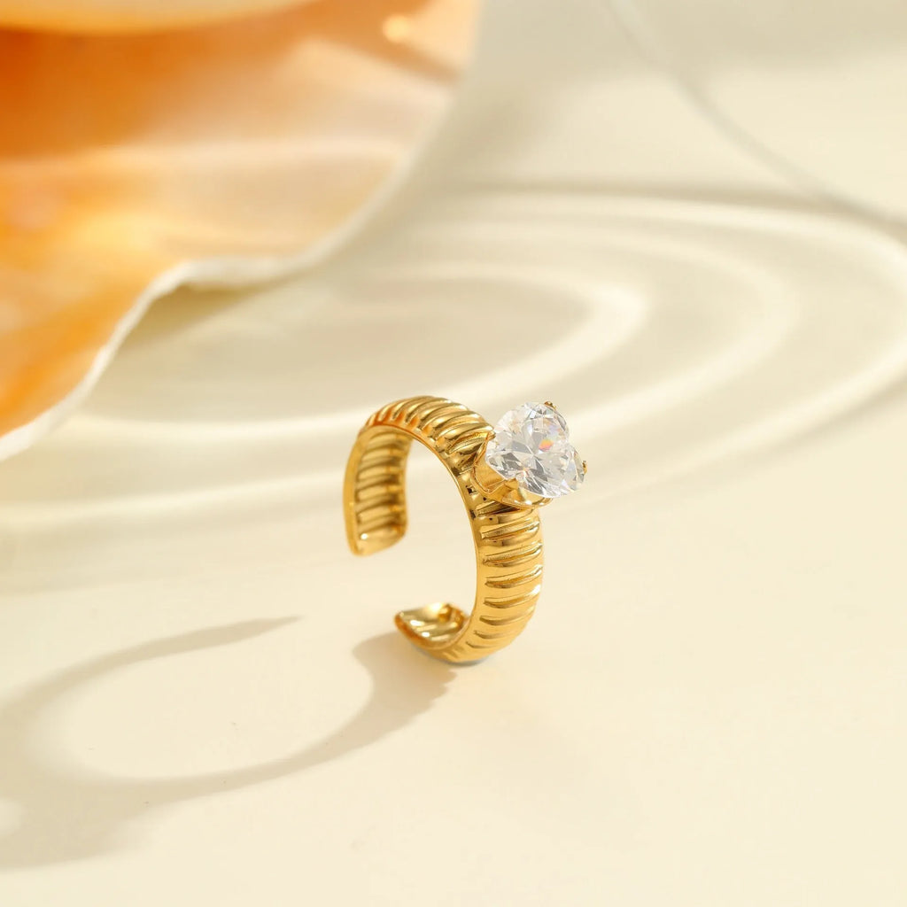 Geometric stainless steel open mouth ring with gold inlaid zircon detailing