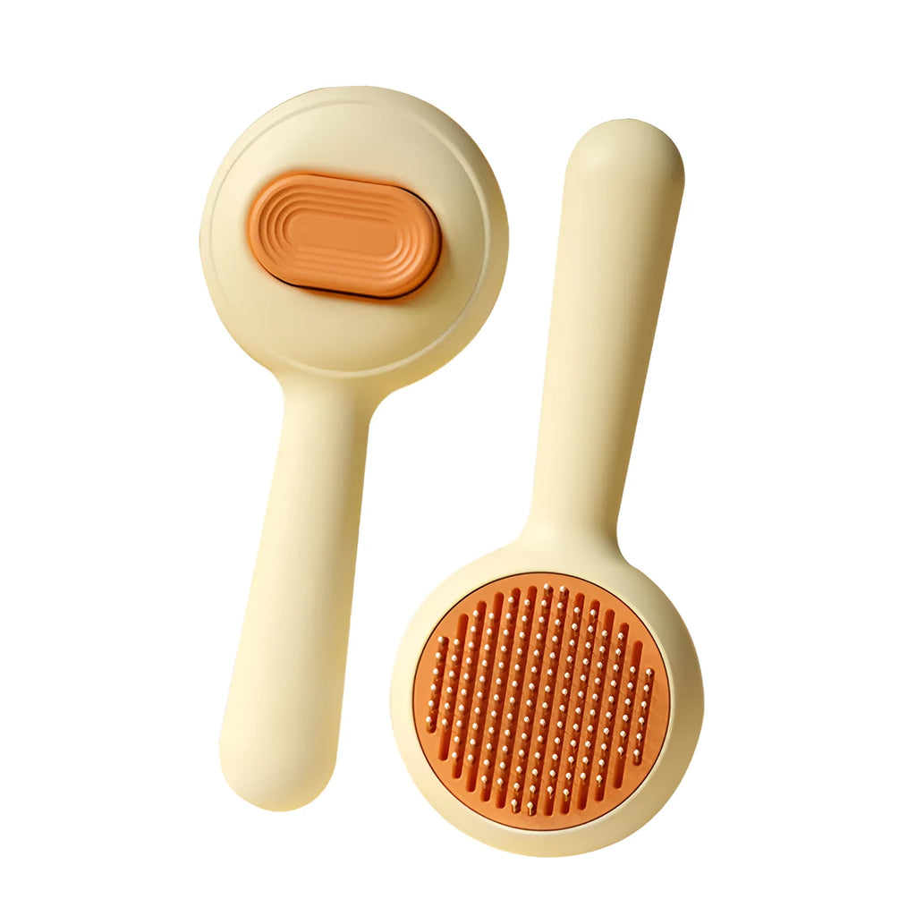 Green pet grooming brush with stainless steel teeth and non-slip handle for cats and dogs