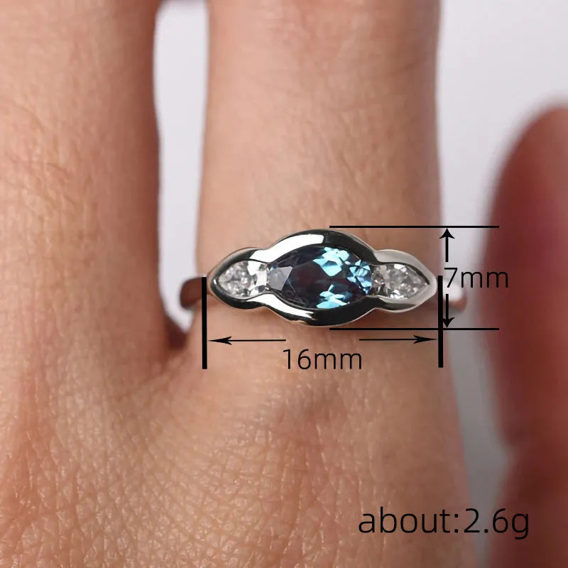 Women's geometric ellipse ring with zircon inlays in Q941 white gold finish