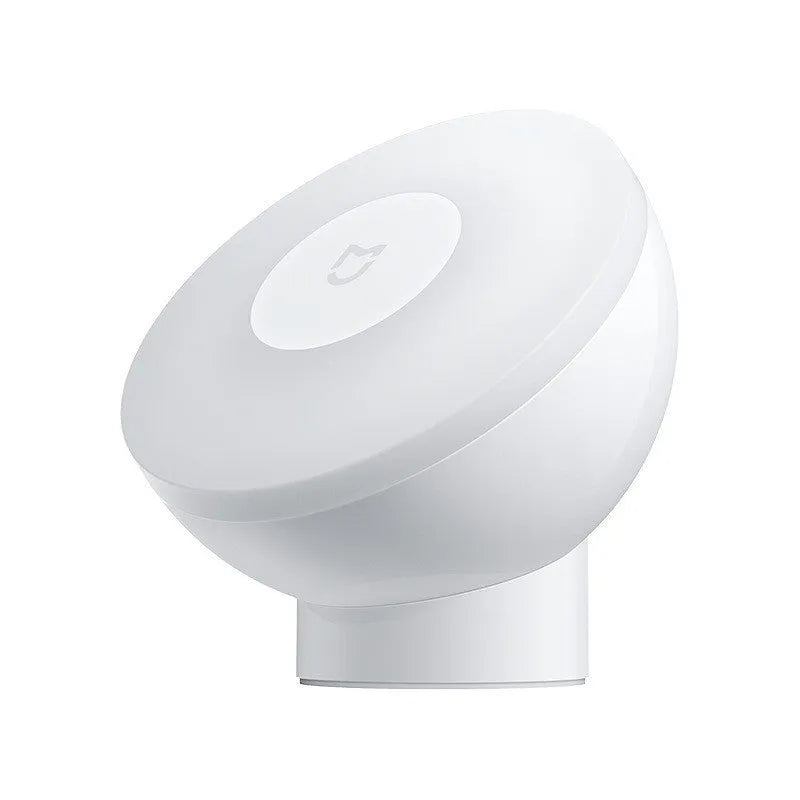 White modern bedside table lamp with Bluetooth and human body sensor.