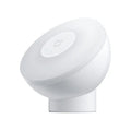 White modern bedside table lamp with Bluetooth and human body sensor.