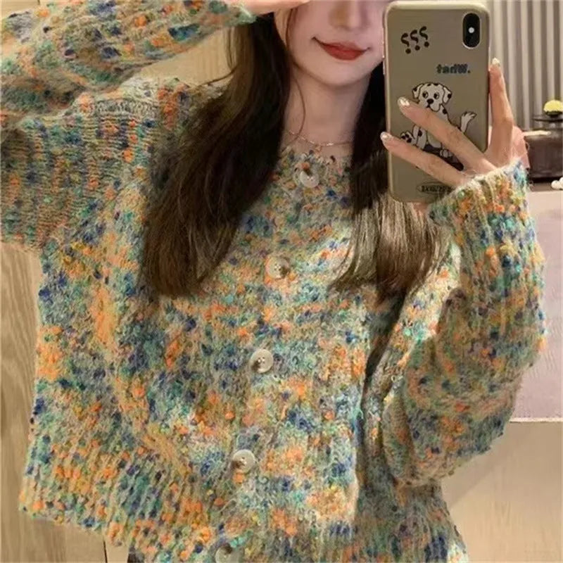 Retro style knitted rainbow cardigan sweater in pink or green colour with toothbrush hair fabric texture