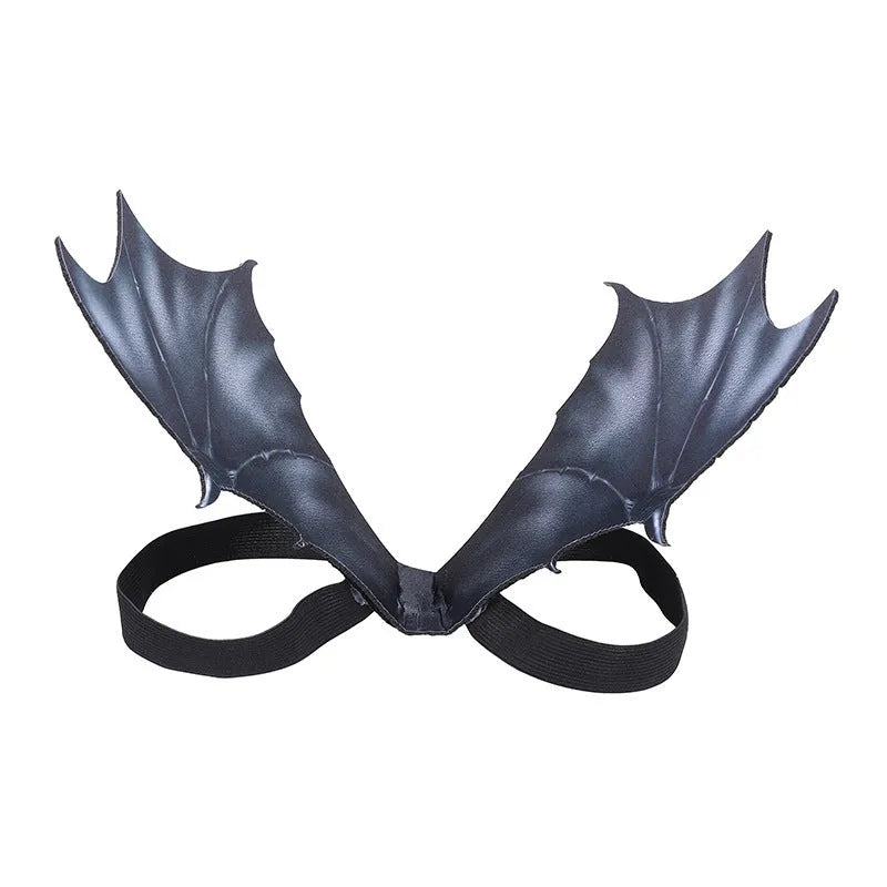 Black cloth bat wing costume for dog or cat on Halloween, shown in three sizes.